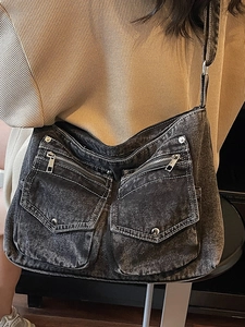 Large denim hobo shoulder bag with utility pockets and metal zippers for casual daily commute