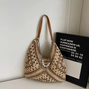 Detailed macro view of beige and brown hollow woven texture with premium leather strap