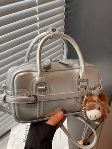 Silver metallic Boston handbag with double handles and a cute brown horse charm