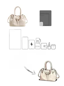 Detailed internal capacity view of contrast woven handbag with various travel essentials