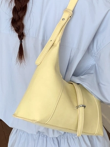 Retro cream yellow leather underarm bag with adjustable strap for daily commute wear