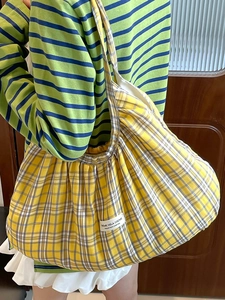 Lightweight yellow checkered shoulder bag with pleated design and high capacity