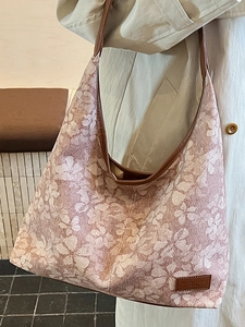 Floral print large capacity tote bag with brown leather trim and shoulder strap