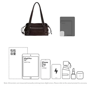 Detail view of coffee canvas tote bag capacity showing 11 inch iPad Pro storage space