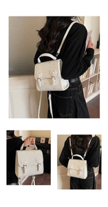 Detail of white PU leather mini backpack with star prints and ribbon buckle closure