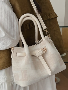 Elegant ivory geometric textured tote bag for women with gold hardware for commuting