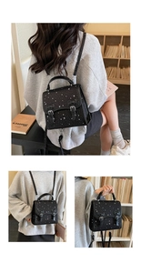 Detail showing stars pattern and bow metal buckles on a black 2-way backpack