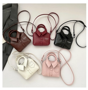 Detailed top view of mini shirt-shaped crossbody bags in five colors with button accents