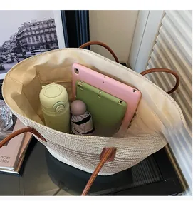 Top view of spacious woven tote interior showing storage capacity for daily essentials