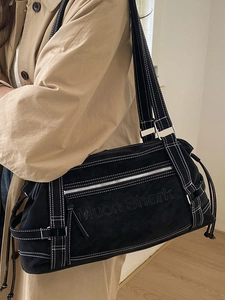 Large black shoulder tote bag with white contrast stitching and Muon Shark logo