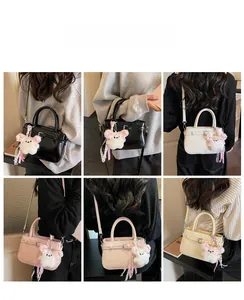 Multiple views showing fashion square handbag styles with plush bear charm detail