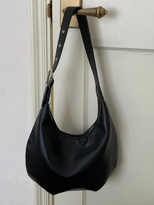 Retro black faux leather hobo shoulder bag with adjustable silver eyelet strap