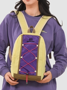 Multicolor drawstring backpack with yellow and purple outdoor style ripstop fabric