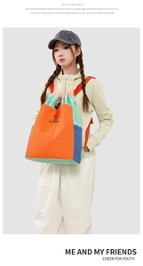 Detailed close-up of a colorful color-block drawstring backpack with vibrant panels