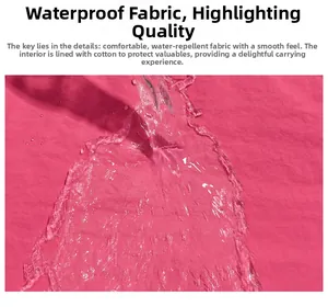 Close-up of waterproof fabric showing water droplets on pink hiking backpack surface