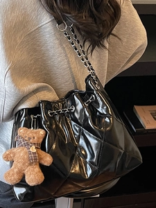Retro black quilted chain shoulder bag with drawstring and plush bear charm for women