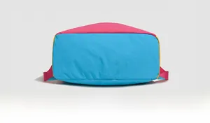 Detail view of colorful patchwork outdoor backpack bottom with blue and pink fabric