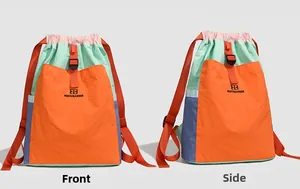 Detail view showing colorful contrast panels and front buckle on the trekking backpack