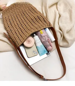 Spacious woven tote bag interior showing capacity for tablet, umbrella and daily essentials