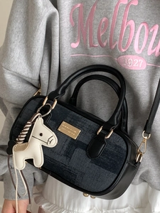 Vintage denim patchwork Boston handbag for women with horse charm and dual handles