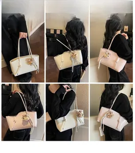 Multiple views of women's vintage tote bag with cute bear charm and textured finish