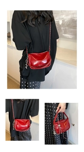 Detailed views of red glossy crossbody bag with metallic chain and fashion logo