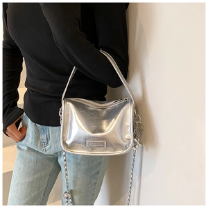 Silver metallic crossbody bag with chain strap and glossy wrinkled texture for women