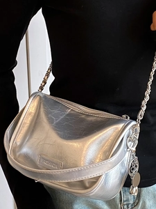 Silver metallic crossbody bag with crinkled texture and chic silver chain strap