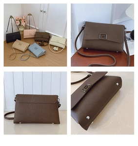 Detail view of the French style rectangular handbag with M-logo buckle and bottom feet