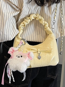 Sac à main plissé jaune pâle chic avec nœud et pendentif cœur sur chaîne en métal