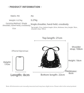 Detailed size chart for black hobo bag with pearl bow and iPhone 16 Pro Max comparison