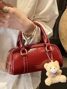 Fashionable red patent leather Boston bag with plush bear pendant for women