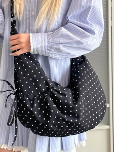 Minimalist large capacity canvas crescent bag with white polka dots and pleated details
