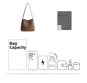 Sac hobo marron montrant une grande capacité pour téléphone, tablette et objets