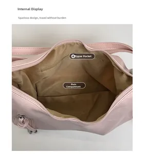 Internal layout of pink tote bag showing the spacious main compartment and zipper pocket