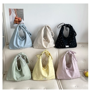 Polka dot canvas tote bags with stylish pleated drawstring handles in six various colors