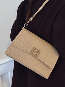 Minimalist French style shoulder bag in light coffee fabric with metal M letter buckle
