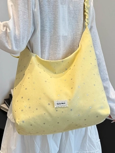 Yellow canvas tote bag with silver star sequins and pleated cloud shoulder strap