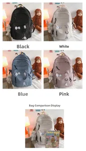 Detailed comparison of student backpacks in four colors with cute bear pendants and pins