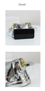 Vue macro du mini sac seau argenté miroir avec chaîne en cœur et détail de perle