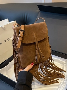 Vintage bruine suède crossbody tas met lange franjes en een verstelbare riem