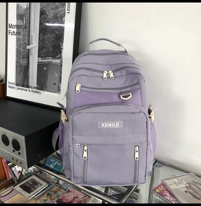 Lavender purple multi-layer backpack with mesh pocket detail and KDMILD logo patch