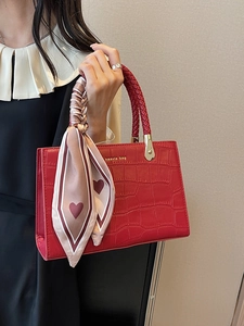 Kaavia red bridal tote bag with crocodile embossing and decorative heart silk scarf