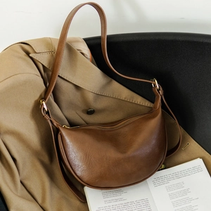 Brown soft leather crescent hobo bag for women with adjustable strap and large capacity
