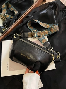 Black PU leather crossbody chest bag with vintage patterned strap and gold hardware