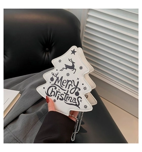 Detail of white Christmas tree leather bag with Merry Christmas print and chain strap