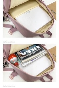 Internal view of the purple backpack showing the laptop sleeve and spacious main compartment