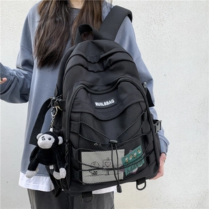 Japanese style black nylon backpack for college students with crossover rope and monkey charm