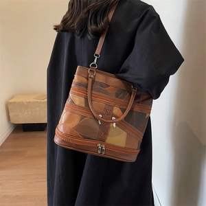 Retro multi-tone brown leather tote bag with geometric patchwork and crossbody strap