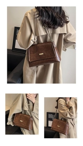 Detailed views of vintage brown leather chain shoulder bag with rectangular metal buckle